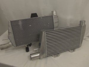 OEM intercooler and current Mishimoto Evolution X intercooler 