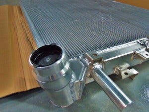 Mishimoto 6.7L Powerstroke prototype radiator inlet