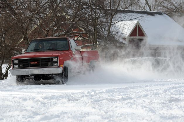 Truck doing donuts in snow 