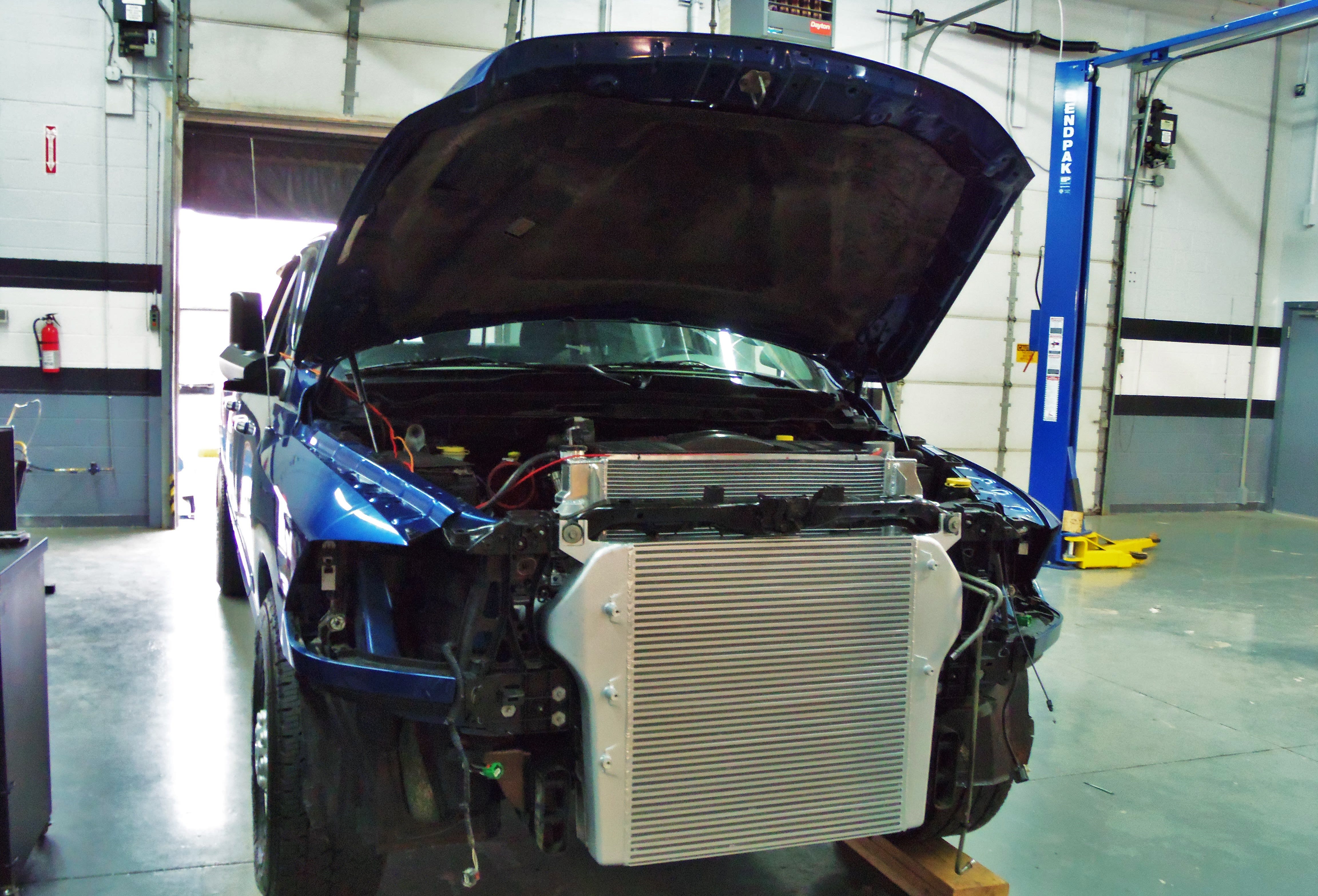 Intercooler with cast end tanks