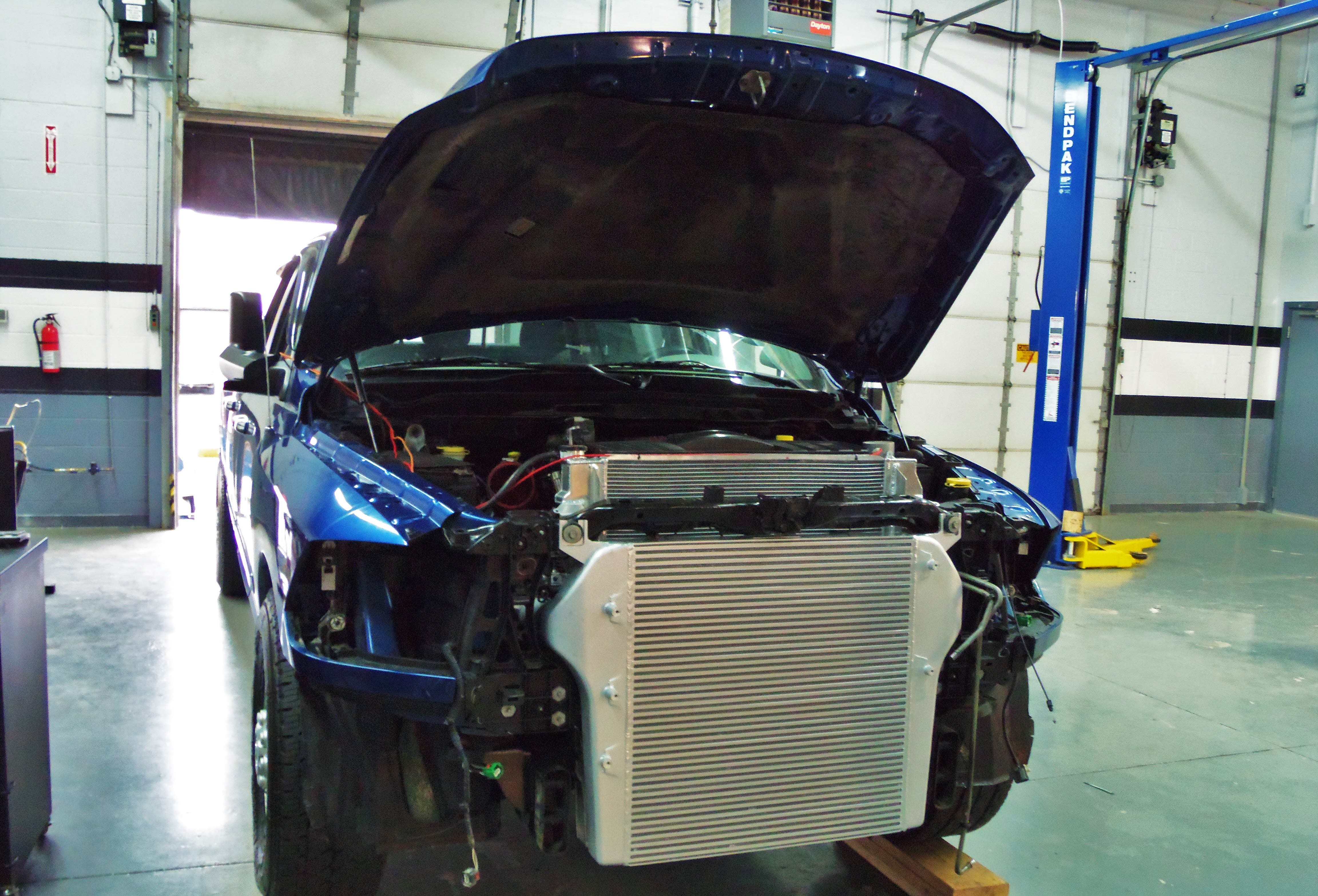 Intercooler with cast end tanks 