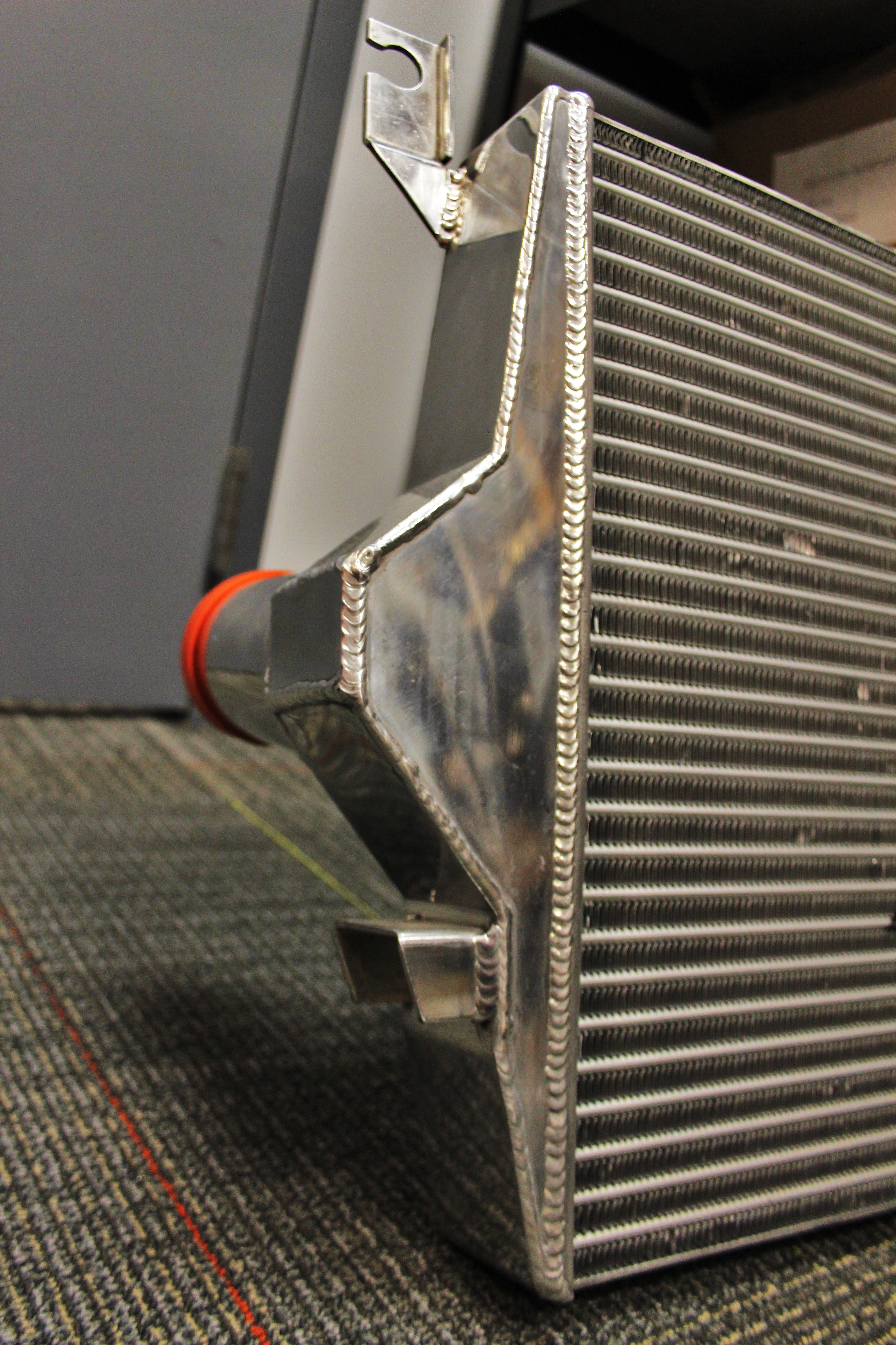 Cut-and-weld intercooler end tanks