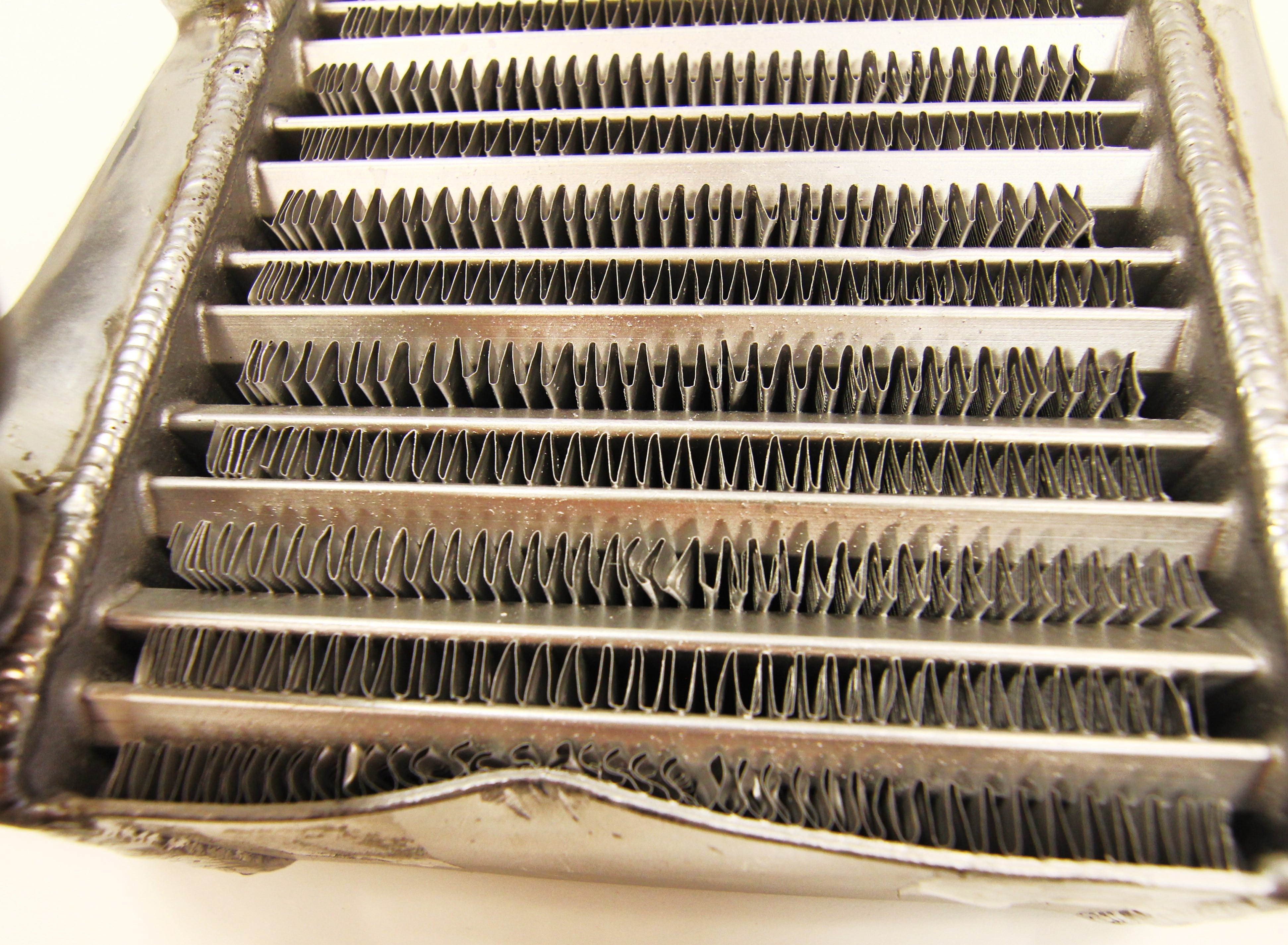 Damaged intercooler core-support plate