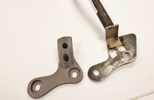 Strut bar bracket: mock-up prototype (right) and 3D-printed bracket (left)