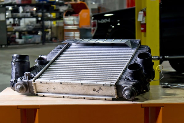 From this angle, you can get a pretty good look at the thickness of the factory intercooler