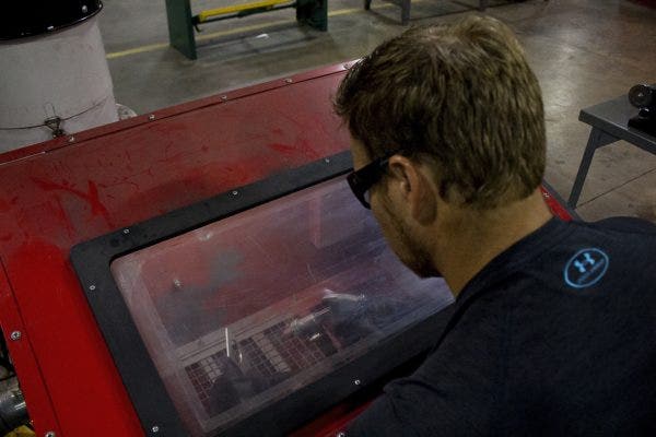 Jason sandblasting the N55 catch can bracket.