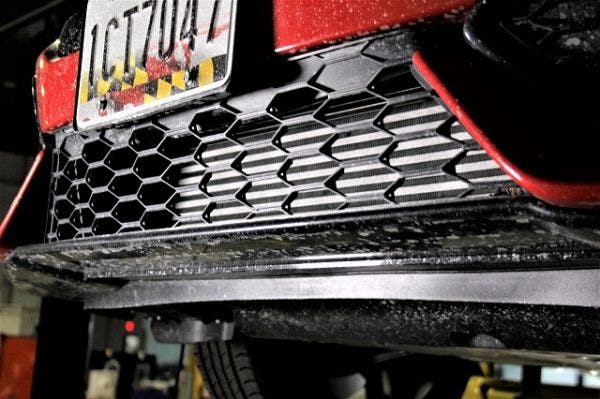 Front grill revealing the stock intercooler