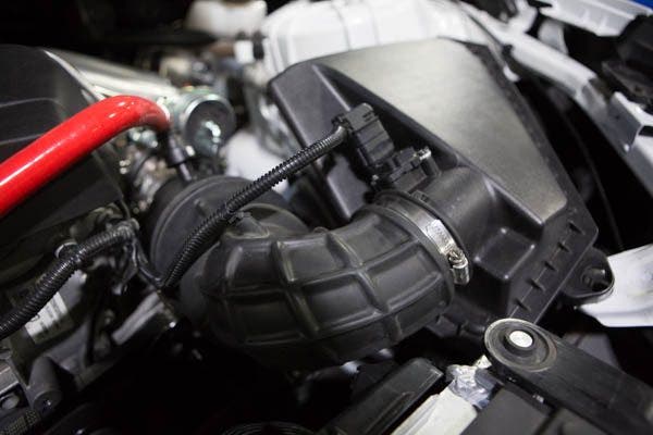 The stock airbox and hose.