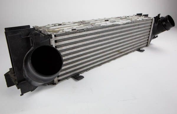 The Stock intercooler unit. Note the guides on the end tanks for seamless mounting under the primary radiator.