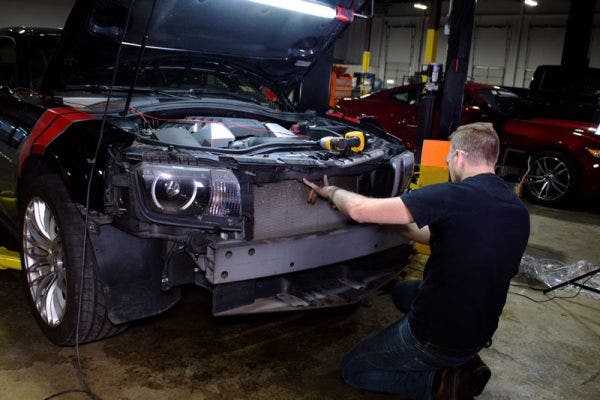 With the bumper off, Jason could find a clean spot to mount our oil cooler core. Jason also wanted to let the Camaro know that it rocks.