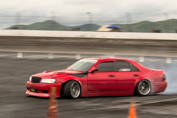 This is a four-door sedan you don't see every day. Can you name it?