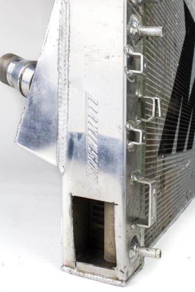 Here you can see the inlet and outlet port of an internal trans cooler, as well as some of the tube that makes up the cooler itself.