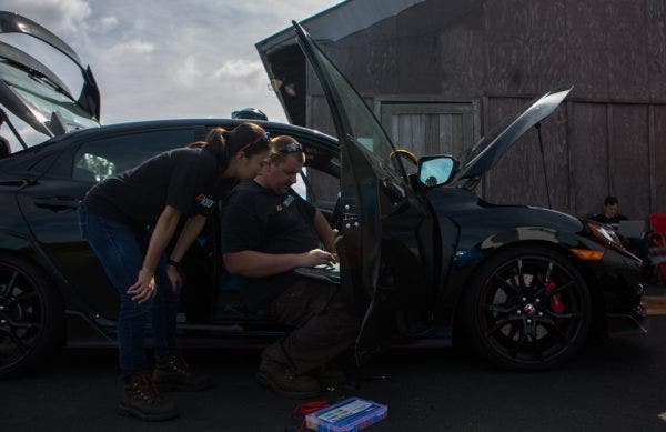 Dan and Ye work on calibrating the data logging software before hitting the track in Englishtown.