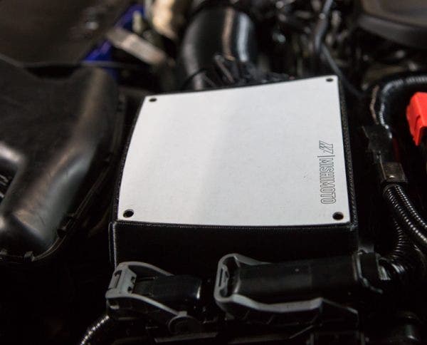 We fully intend on providing a lid with this intake kit, but you'll have to wait and see what it will be made of.