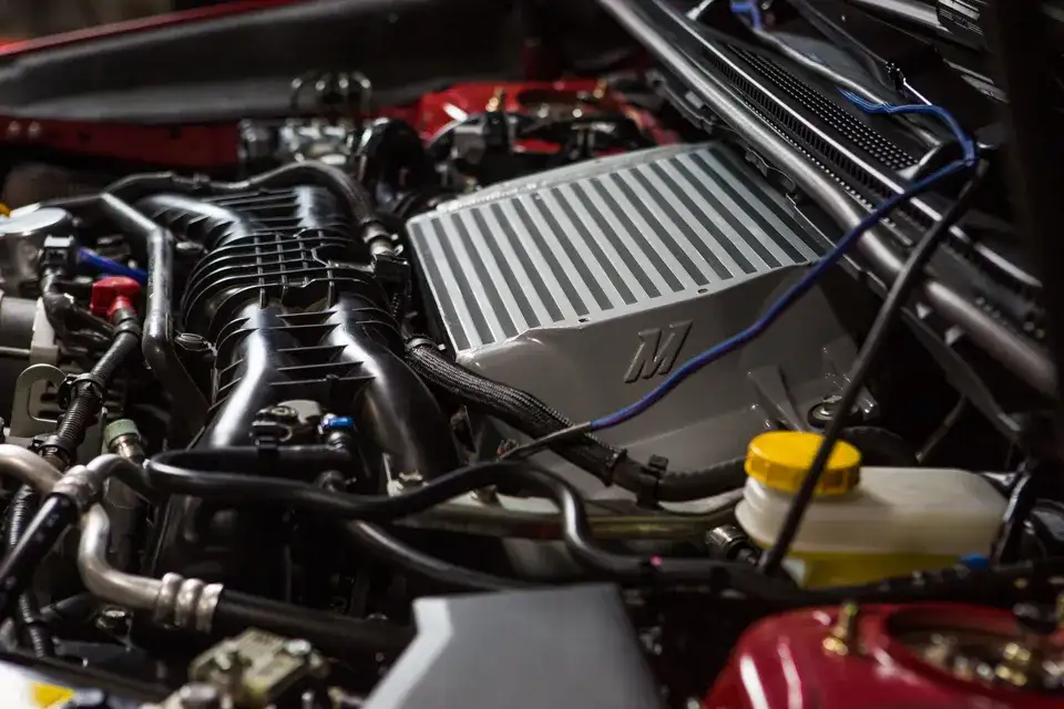 A top-mount performance Mishimoto intercooler.