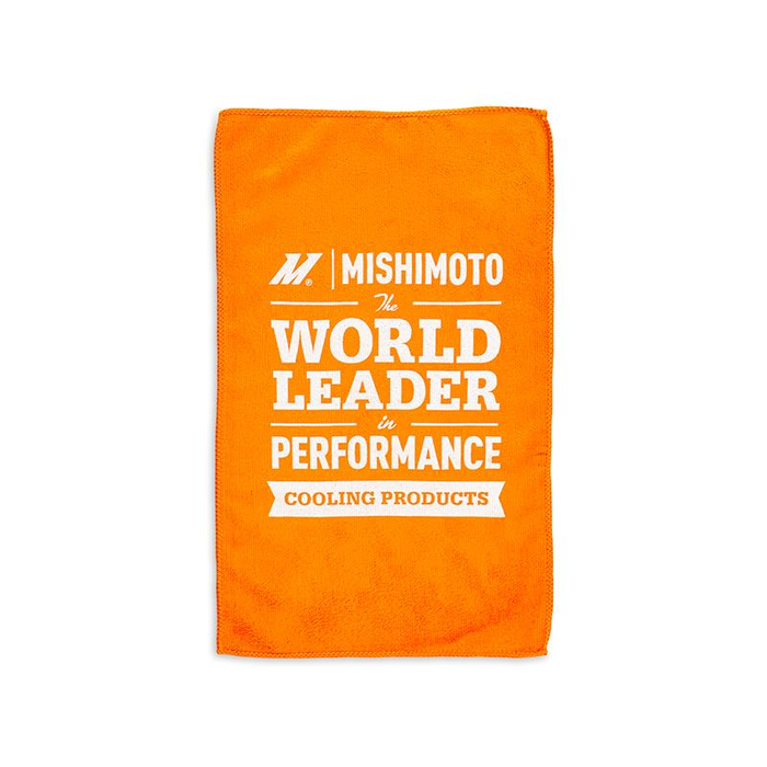 An image of an orange, microfiber detailing cloth with white text that reads