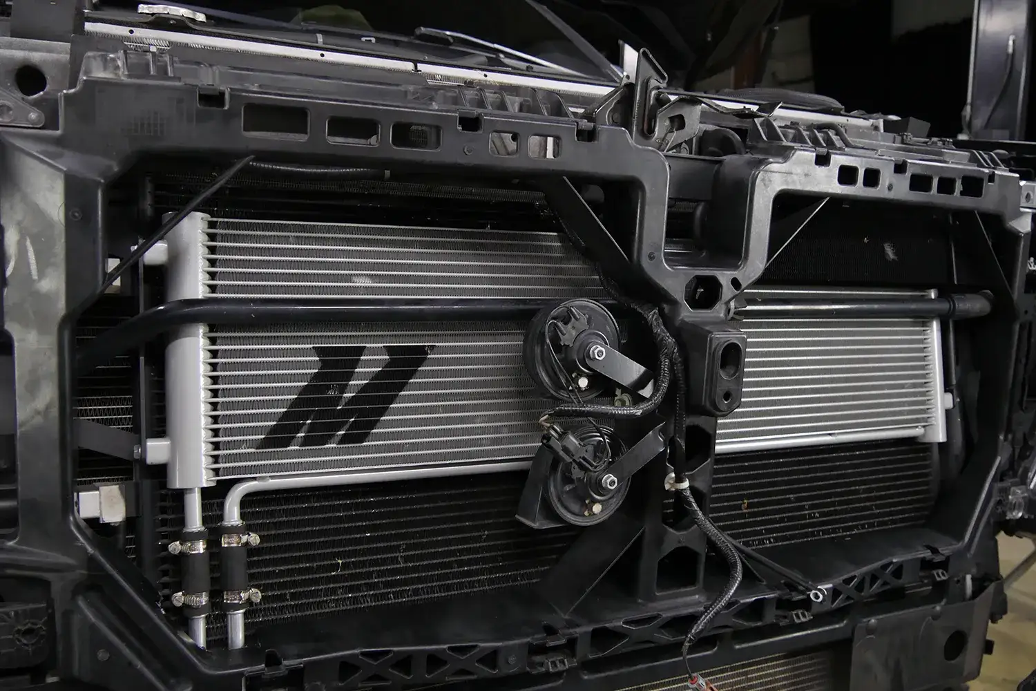 An image of the transmission cooler for the 2020-2022 Ford 6.7L Powerstroke installed.